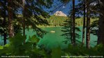 Chinook Lake Provincial Recreation Area, Alberta, Canada. Kayakers with Crowsnest Mountain over the ridge