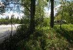 Click to enlarge Castle Falls Provincial Recreation Area, Alberta, Canada. A campsite at the rivers edge at Castle Falls.