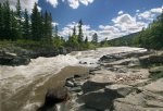 Click to enlarge Castle Falls Provincial Recreation Area, Alberta, Canada. High spring runoff makes for rushing rapids at Castle Falls.