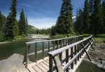 Click to enlarge Racehorse Creek Provincial Recreation Area, Alberta, Canada. You get a great view of Vicary Creek flowing into Racehorse Creek from the bridge.