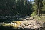 Livingstone Falls Provincial Recreation Area, Alberta, Canada. The main part of the Livingstone River flows on the other side of the island area.