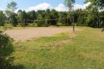 Click to enlarge Craigleith Provincial Park, Ontario, Canada. Volleyball court next to playground.