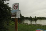 Click to enlarge Earl Rowe Provincial Park, Ontario, Canada. Small lake with swimming area. When beach closed due to high bacteria levels there is still the park pool.