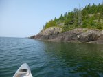 Click to enlarge Neys Provincial Park, Ontario, Canada. Canoeing in Lake Superior along the rocky shoreline.