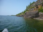 Click to enlarge Neys Provincial Park, Ontario, Canada. Canoeing in Lake Superior along the rocky shoreline.