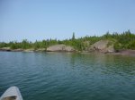Click to enlarge Neys Provincial Park, Ontario, Canada. Canoeing in Lake Superior along the rocky shoreline.