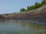 Click to enlarge Neys Provincial Park, Ontario, Canada. Canoeing in Lake Superior along the rocky shoreline.
