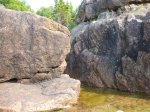 Click to enlarge Neys Provincial Park, Ontario, Canada. Canoeing in Lake Superior along the rocky shoreline.