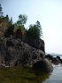 Click to enlarge Neys Provincial Park, Ontario, Canada. Canoeing in Lake Superior along the rocky shoreline.
