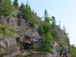 Click to enlarge Neys Provincial Park, Ontario, Canada. Canoeing in Lake Superior along the rocky shoreline.