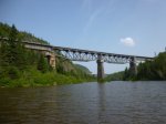 Click to enlarge Neys Provincial Park, Ontario, Canada. Canoeing on Little Pic River. River crosses under railway bridge.