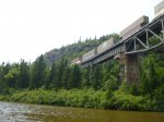 Click to enlarge Neys Provincial Park, Ontario, Canada. Canoeing on Little Pic River. Train passing overhead.