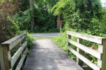 Click to enlarge Point Farms Provincial Park, Ontario, Canada. Foot bridge from camping area to roadway to beach.