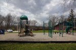 Click to enlarge Wheatley Provincial Park, Ontario, Canada. Playground, washrooms and parking lot visible.
