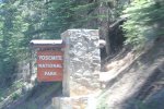 Click to enlarge Yosemite National Park, California, United States. A park sign welcoming you as you enter Yosemite National Park.
