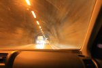 Click to enlarge Yosemite National Park, California, United States. A few tunnels have been cut through the mountains. This is a view of driving through one of them.