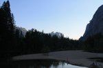 Click to enlarge Yosemite National Park, California, United States. Swimming with a view of the mountains at Swinging Bridge in the Yosemite Valley.