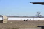 Click to enlarge Boyd Lake State Park, Colorado, United States. Picnic area with Ice Fishing in background