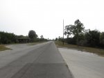 E G Simmons County Park, Florida, United States. Main park road showing one of the several picnic shelters available.