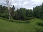 Click to enlarge Alpine Campground, Michigan, United States. Pond in the Open Area.