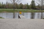 Click to enlarge Aloha State Park, Michigan, United States. Boat launch in the campground for Mullet Lake.