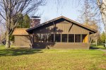Brimley State Park, Michigan, United States. Enclosed picnic shelter with stone fireplace.