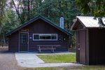 Click to enlarge Harrisville State Park, Michigan, United States. Sunrise Cabin located by the day use beach area. The cabin is rustic with no electric. There is a vault toilet located outside the cabin.
