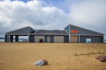 Petoskey State Park, Michigan, United States. Park store with restrooms and changing rooms located in the day use area on the beach. 