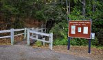 Petoskey State Park, Michigan, United States. The trailhead for Old Baldy. Old Baldy is a half mile trail that leads to the top of a sand dune for panoramic views of Lake Michigan. This is one of two trails in the park. 