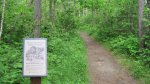 Click to enlarge Itasca State Park, Minnesota, United States. Sign and trail leading to the Indian Burial Mounds.