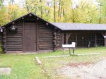 Click to enlarge Itasca State Park, Minnesota, United States. Historic icehouse and woodshed.