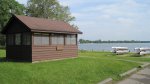 Click to enlarge Lake Carlos State Park, Minnesota, United States. Fish cleaning building and canoes near the boat launch area.