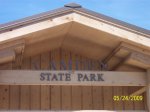 Camden State Park, Minnesota, United States. State Park sign on building.