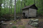 Click to enlarge Tishomingo State Park, Mississippi, United States. Old mill cabin near day use area.
