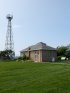 Golden Hill State Park, New York, United States. Golden Hill State Park (NY) - Lighthouse Visitor Center and old radio tower