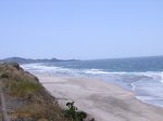 Beverly Beach State Park, Oregon, United States. Coastal beach facing South showing Yaquina Lighthouse 