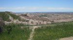 Click to enlarge Badlands National Park, South Dakota, United States. Mountain goats in the middle of the photo.
