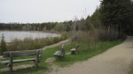 Click to enlarge Peninsula State Park, Wisconsin, United States. Benches along the trails and Green Bay on Lake Michigan. This is near the Canoe and Kayak launnch area in the Tennison Bay campground.