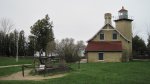 Click to enlarge Peninsula State Park, Wisconsin, United States. View of the Eagle Bluff Lighthouse and a big anchor.