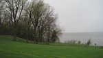 Click to enlarge High Cliff State Park, Wisconsin, United States. Picnic tables near the water.
