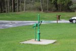 Kohler-Andrae State Park, Wisconsin, United States. A green water pump.
