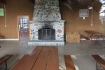 Kohler-Andrae State Park, Wisconsin, United States. Inside of the shelter.  Numerous picnic tables and fireplace make a wonderful year round facility.