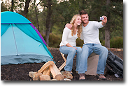 Guy and Girl Enjoying Camping